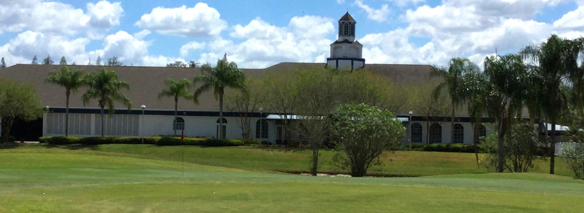 Golf Course with trees and clubhouse